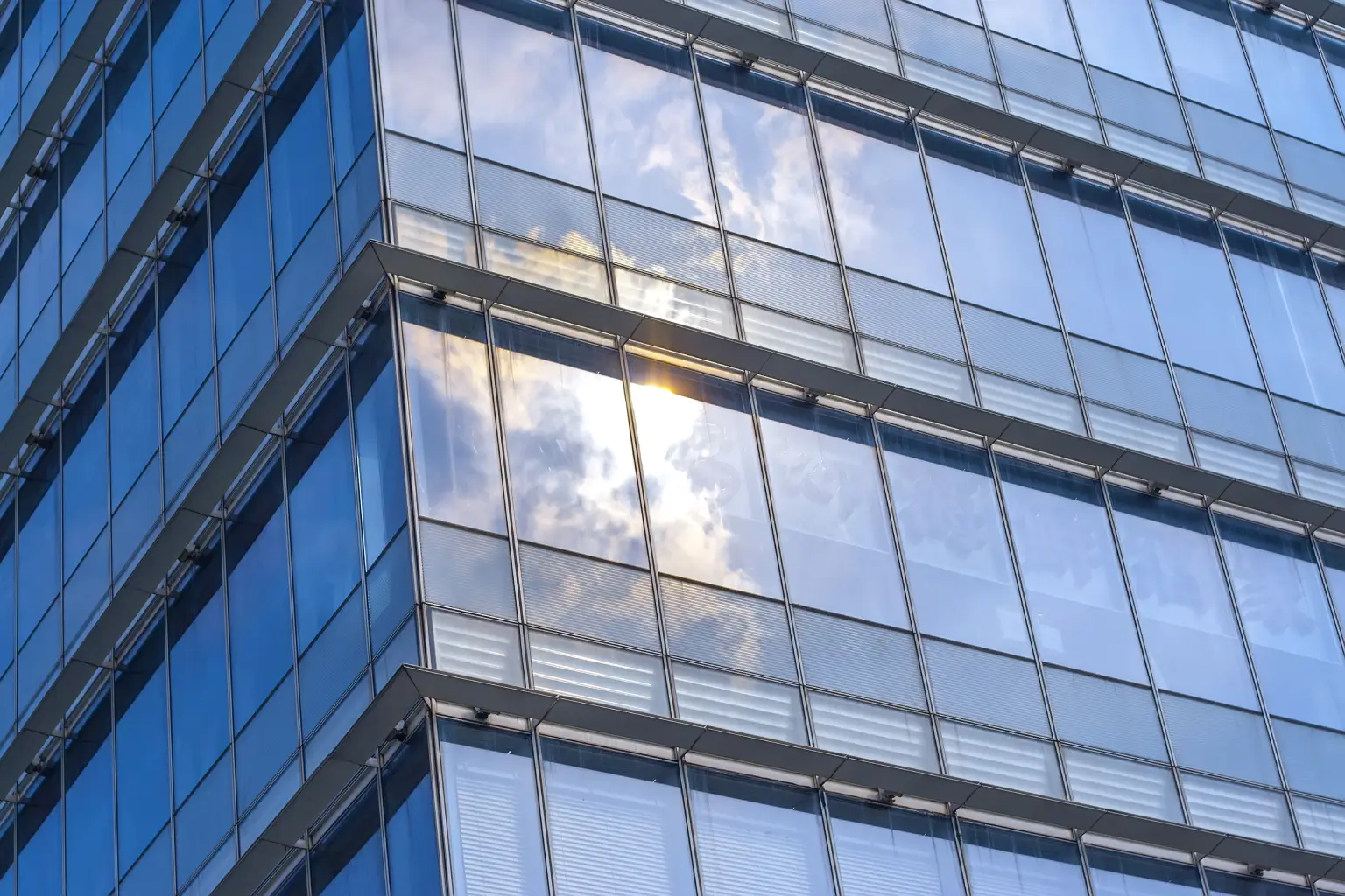 clouds-reflected-windows-contemporary-building clouds-reflected-windows-contemporary-building